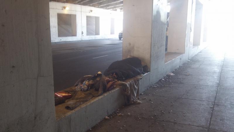 Homeless Man sleeping under a viaduct off of Irving Park Rd Chicago